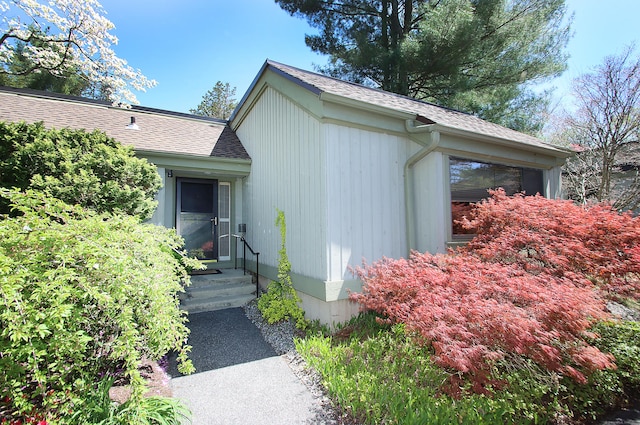 701 Heritage Vlg Unit B, Southbury, CT 06488 - view of side of property featuring roof with shingles