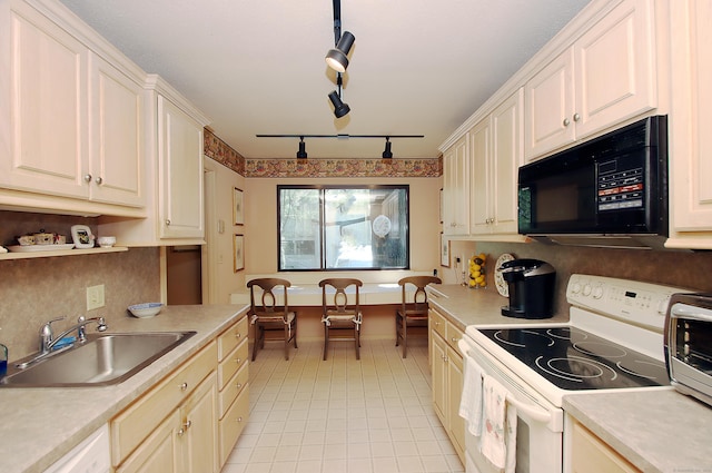 701 Heritage Vlg Unit B, Southbury, CT 06488 - kitchen featuring white appliances, light countertops, light tile patterned flooring, backsplash, and track lighting