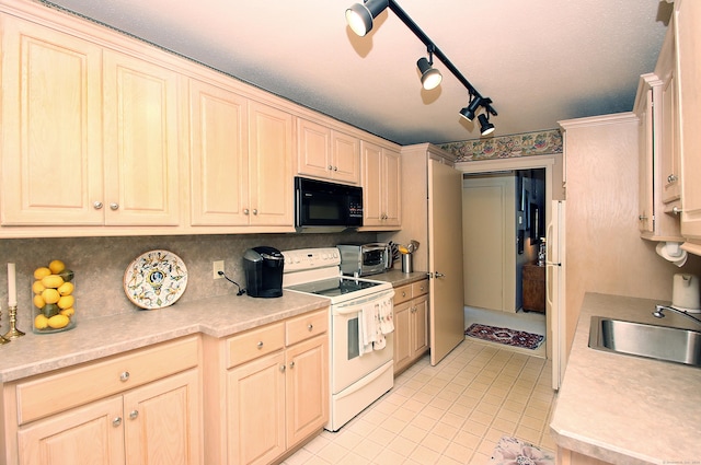 701 Heritage Vlg Unit B, Southbury, CT 06488 - kitchen with white electric stove, black microwave, light tile patterned flooring, light countertops, and backsplash