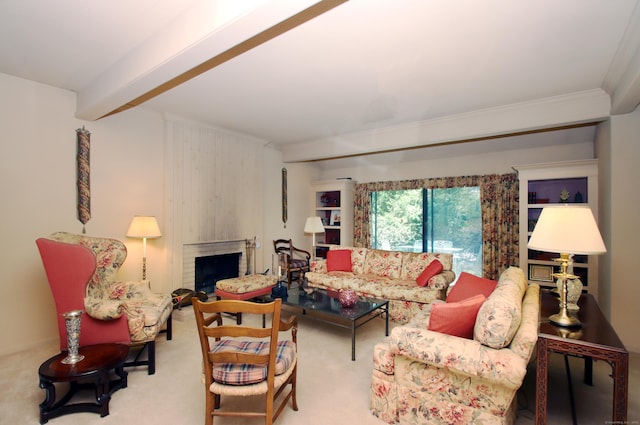 701 Heritage Vlg Unit B, Southbury, CT 06488 - living area with carpet floors, crown molding, a brick fireplace, and beam ceiling