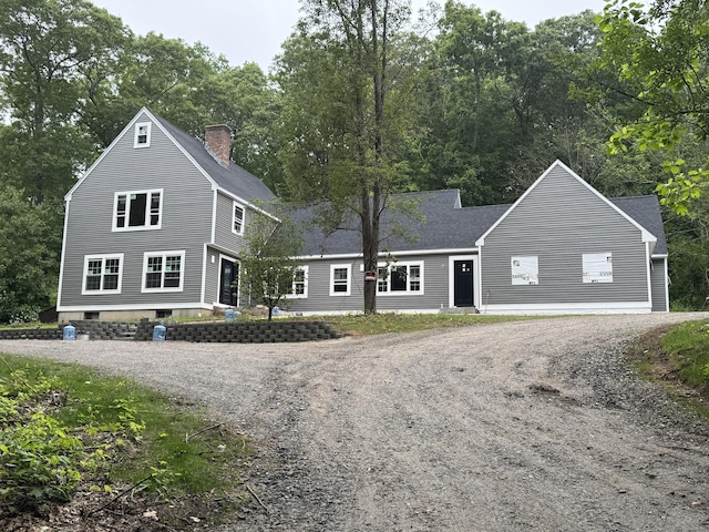45 Clark Rd, Lyme, CT 06371 - view of front of home with a chimney, dirt driveway, and a shingled roof