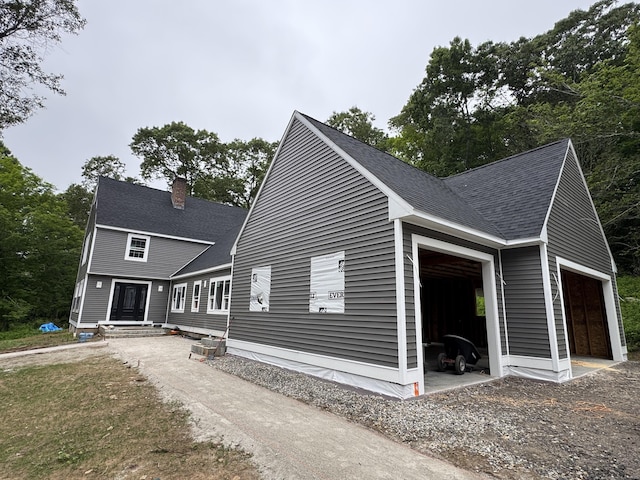45 Clark Rd, Lyme, CT 06371 - view of front of property with a chimney and roof with shingles