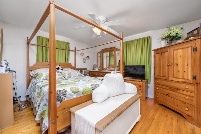 bedroom featuring a ceiling fan and light wood-style flooring
