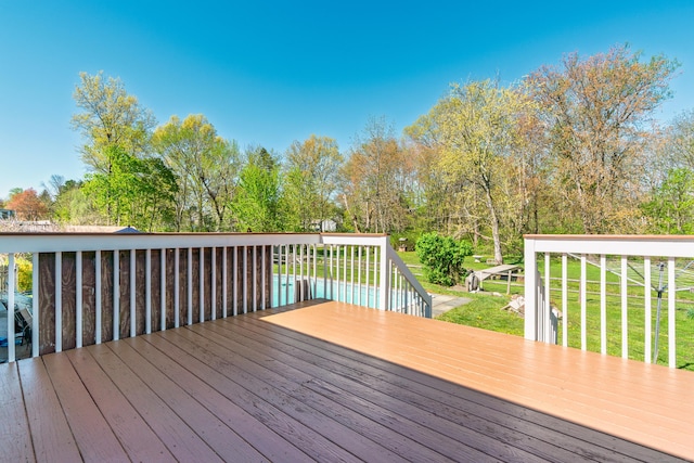 deck featuring a yard