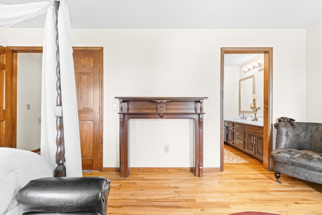 sitting room with light wood-type flooring