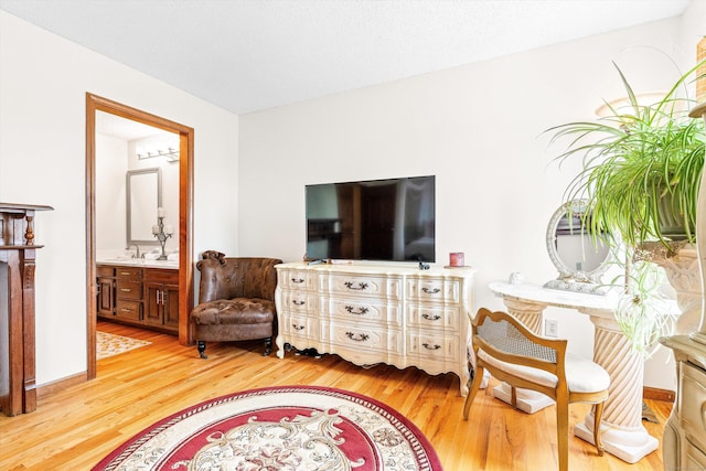 living area featuring light wood-style flooring