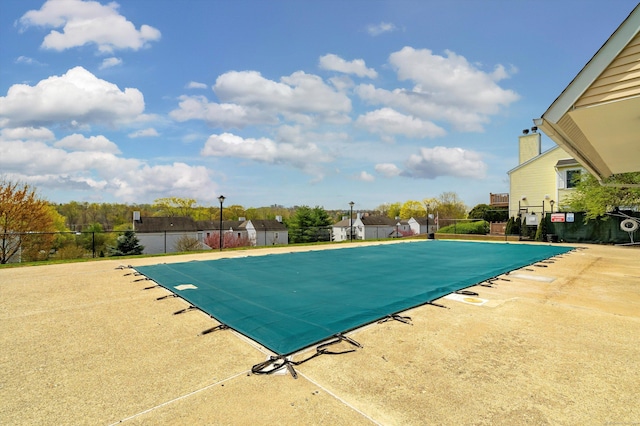 pool featuring fence