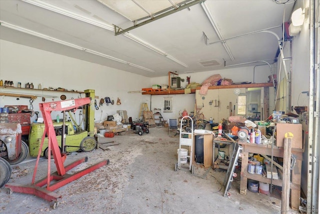 garage with a workshop area