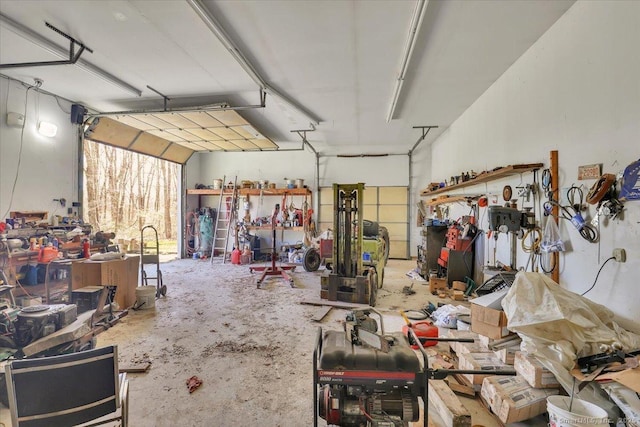 garage with a workshop area
