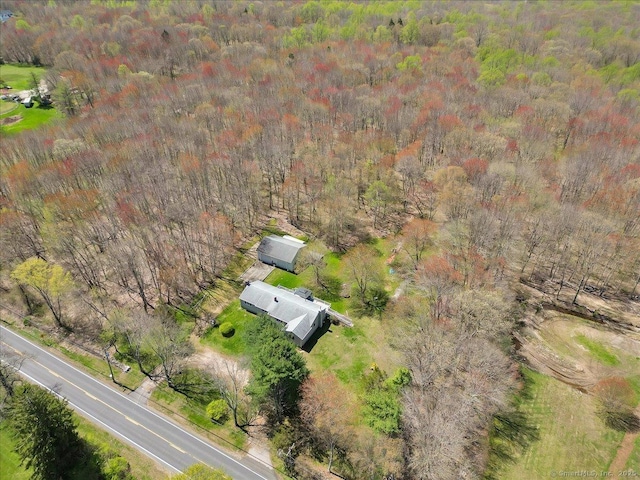 aerial view featuring a forest view