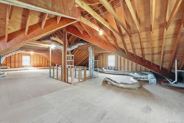 attic featuring an upstairs landing