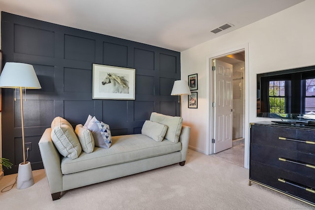 1803 Revere Rd, Danbury, CT 06811 - living room featuring visible vents, a decorative wall, and light colored carpet