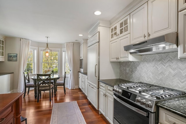 1803 Revere Rd, Danbury, CT 06811 - kitchen featuring white cabinetry, decorative backsplash, gas range, under cabinet range hood, and glass insert cabinets