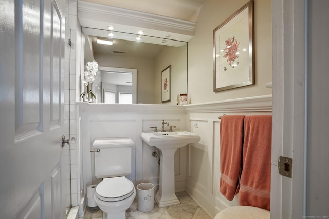 1803 Revere Rd, Danbury, CT 06811 - half bath featuring toilet, visible vents, wainscoting, and a decorative wall