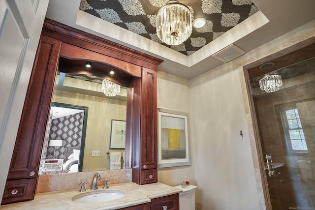 1803 Revere Rd, Danbury, CT 06811 - ensuite bathroom with connected bathroom, a notable chandelier, vanity, toilet, and visible vents