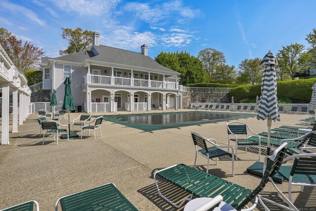 1803 Revere Rd, Danbury, CT 06811 - pool featuring a patio area and fence