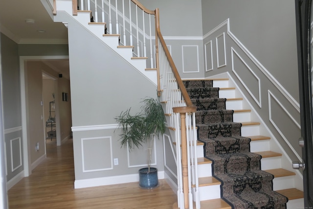 46 Brookfield Rd, Seymour, CT 06483 - stairs featuring wood finished floors, crown molding, and baseboards