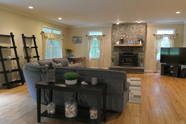 46 Brookfield Rd, Seymour, CT 06483 - living area featuring ornamental molding, light wood-style floors, recessed lighting, a wood stove, and baseboards