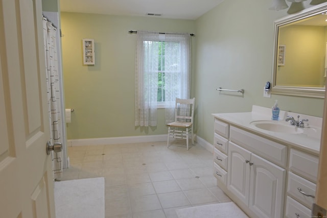 46 Brookfield Rd, Seymour, CT 06483 - bathroom with vanity, baseboards, and tile patterned floors