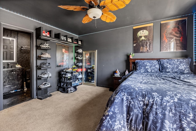 bedroom with carpet flooring, a ceiling fan, and baseboards