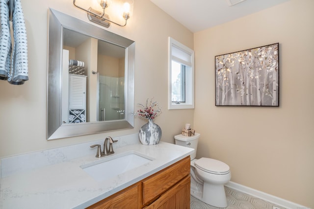 full bath with vanity, toilet, and a shower