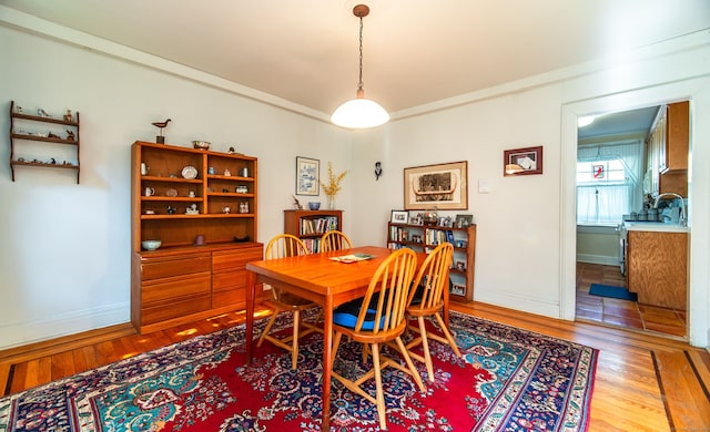 496 Whitney Ave Unit 1C, New Haven, CT 06511 - dining area with baseboards and wood finished floors