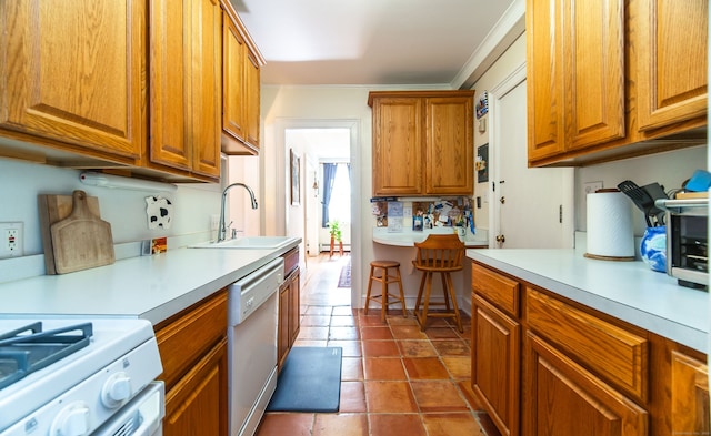 496 Whitney Ave Unit 1C, New Haven, CT 06511 - kitchen with a sink, white appliances, light countertops, and brown cabinets