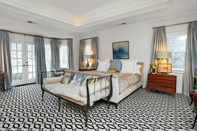 carpeted bedroom with french doors, access to exterior, crown molding, visible vents, and a tray ceiling