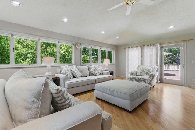 17 Pasture Ln, Glastonbury, CT 06073 - living area with a textured ceiling, recessed lighting, ceiling fan, light wood-style flooring, and vaulted ceiling