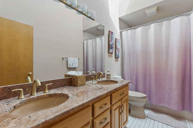 17 Pasture Ln, Glastonbury, CT 06073 - bathroom featuring tile patterned flooring, toilet, and double vanity