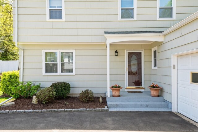 35 Hampton Ln, Stamford, CT 06903 - doorway to property with a garage