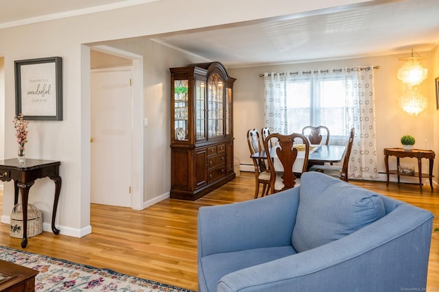 35 Hampton Ln, Stamford, CT 06903 - living room with wood finished floors, crown molding, baseboards, and a baseboard heating unit