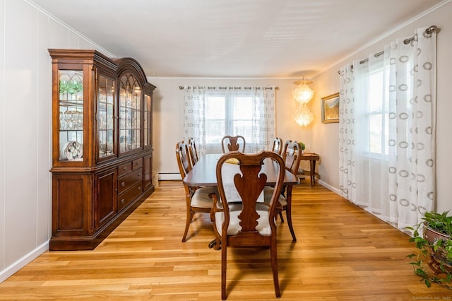 35 Hampton Ln, Stamford, CT 06903 - dining space featuring crown molding, light wood-style flooring, and a baseboard heating unit