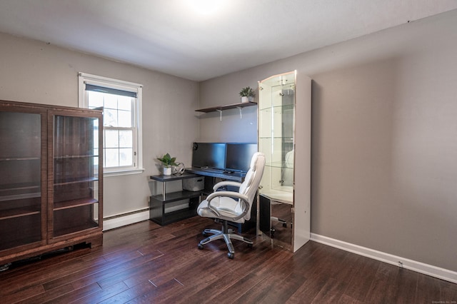 office area with baseboards, wood finished floors, and a baseboard radiator