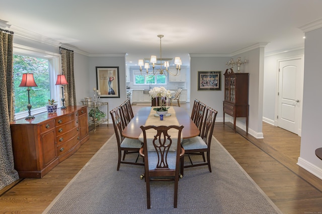 72 S Salem Rd, Ridgefield, CT 06877 - dining room featuring wood finished floors, a chandelier, healthy amount of natural light, and ornamental molding