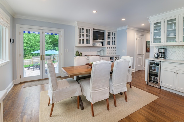 72 S Salem Rd, Ridgefield, CT 06877 - dining space featuring wine cooler, crown molding, recessed lighting, dark wood-style flooring, and french doors