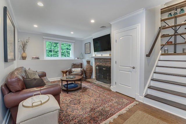 72 S Salem Rd, Ridgefield, CT 06877 - living room with ornamental molding, baseboards, recessed lighting, stairs, and a brick fireplace