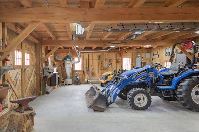 garage with wood walls