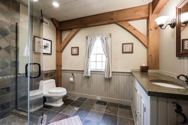 bathroom featuring a shower stall, visible vents, toilet, and a wainscoted wall