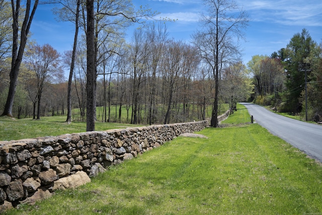 exterior space with a view of trees