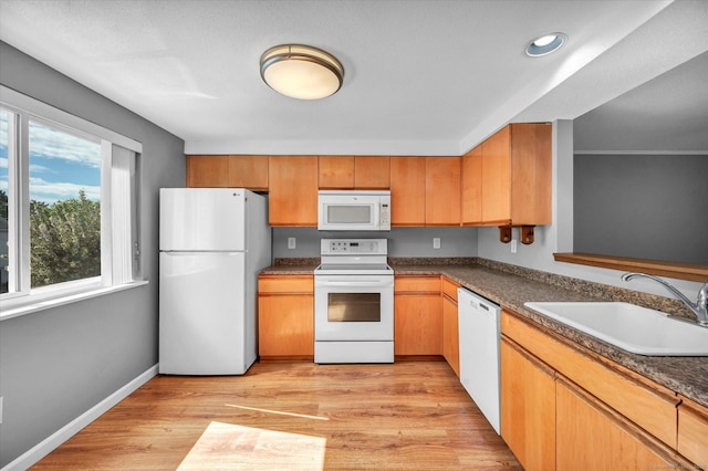 37 Valley Run Dr Unit 37, Cromwell, CT 06416 - kitchen with white appliances, a sink, dark countertops, light wood-type flooring, and recessed lighting