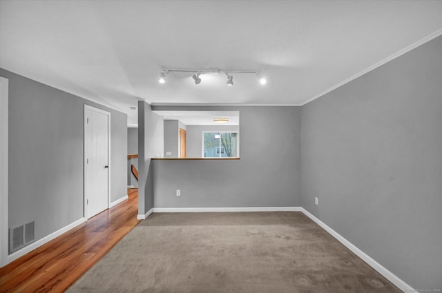 37 Valley Run Dr Unit 37, Cromwell, CT 06416 - carpeted spare room featuring track lighting, baseboards, and ornamental molding