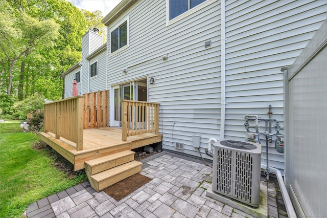37 Valley Run Dr Unit 37, Cromwell, CT 06416 - wooden deck featuring a patio, central air condition unit, and a lawn