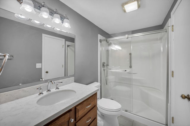 37 Valley Run Dr Unit 37, Cromwell, CT 06416 - full bath featuring a stall shower, toilet, vanity, and tile patterned floors