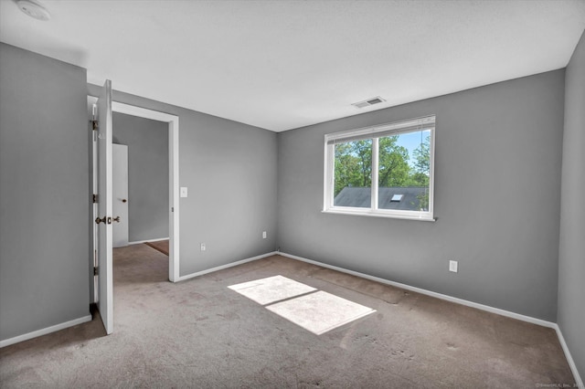 37 Valley Run Dr Unit 37, Cromwell, CT 06416 - spare room featuring baseboards, a smoke detector, and carpet flooring