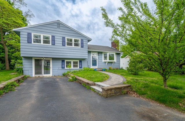 14 Bassett Rd, Branford, CT 06405 - tri-level home with a chimney
