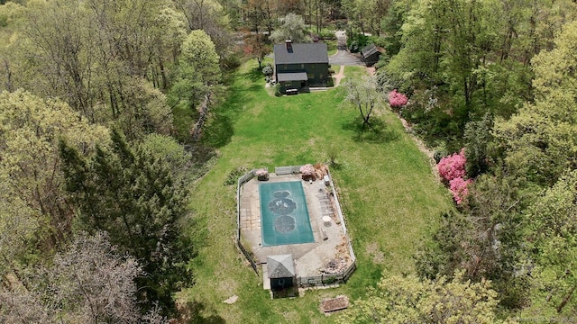 aerial view featuring a view of trees