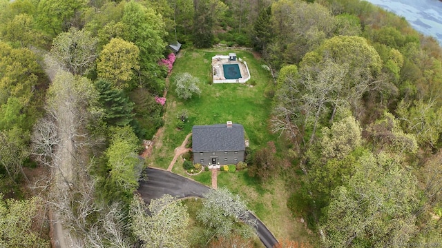 drone / aerial view with a view of trees