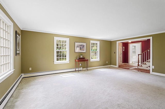 carpeted empty room featuring baseboards, a baseboard radiator, ornamental molding, and stairs