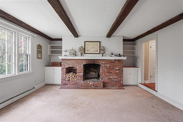 unfurnished living room with a fireplace, baseboard heating, beamed ceiling, and carpet floors